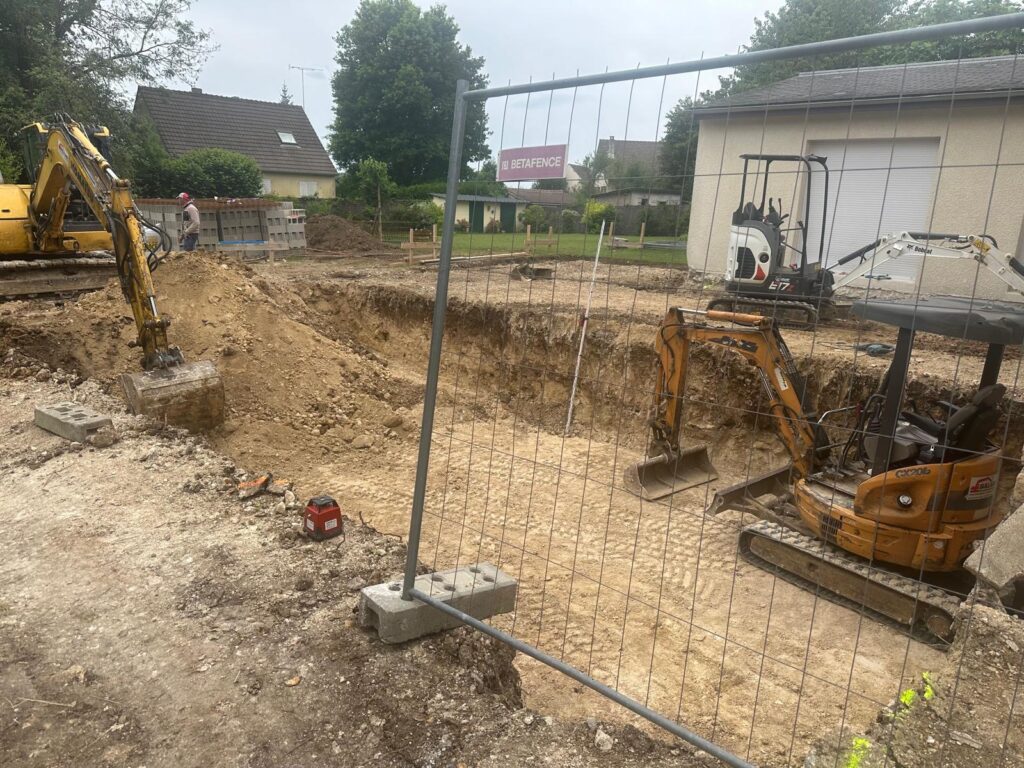 Extension de maison avec piscine couverte à Coupvray par Legendre Frères